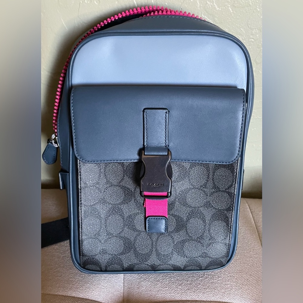 Coach - with coach pattern/logo backpack blue gray pink. Used once.